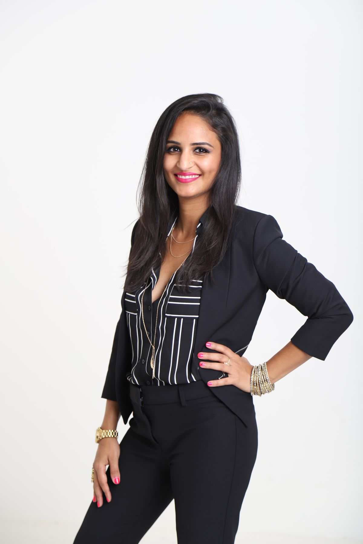 Taniya Refai standing in a black blazer